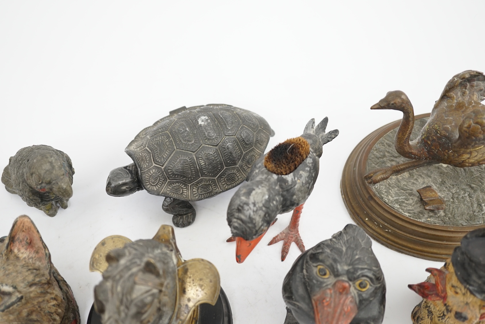 A collection ten 19th and 20th century novelty animal bronze and metal ink wells, including a Martin Brothers style ‘Wally’ inkwell